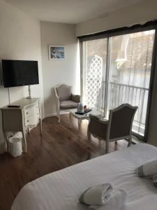 Hotels L'estacade : photos des chambres