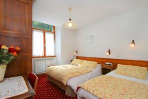 Hotels Chateau De La Muzelle : Chambre Quadruple