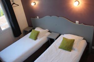 Comfort Twin Room room in Le Thimothée : Hôtel & Studios