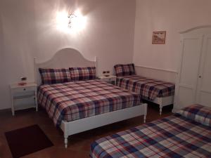 Quadruple Room with Garden View room in Cortecoraman