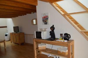 Appartements Le Pressoir des 4 Saisons : photos des chambres