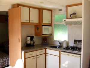 Chalets Stacaravan 4 of 6 persoons - Camping Le Soustran : photos des chambres