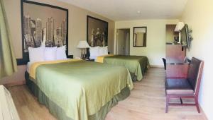 Queen Room with Two Queen Beds room in Super 8 by Wyndham San Diego Hotel Circle