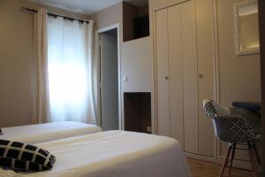 Hotels Les Glycines : photos des chambres