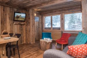 Appart'hotels Le Couaroge Chalets et Appartements : photos des chambres