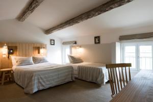 Hotels Auberge de la Commanderie : photos des chambres