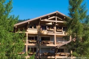 Appart'hotels Le Couaroge Chalets et Appartements : photos des chambres