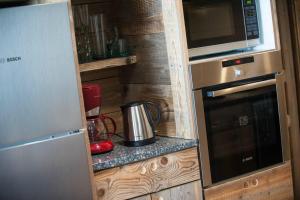 Appart'hotels Le Couaroge Chalets et Appartements : photos des chambres