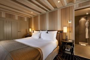 Hotels Le Pavillon de la Reine & Spa : photos des chambres