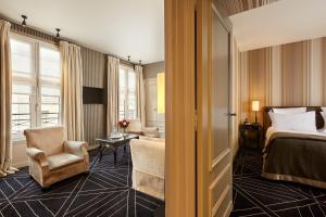 Hotels Le Pavillon de la Reine & Spa : photos des chambres