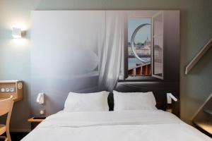 Hotels B&B HOTEL Nantes Parc Expos La Chapelle : Chambre Quadruple