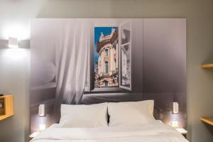 Hotels B&B HOTEL Toulouse Cite de l'Espace Mouchotte : photos des chambres