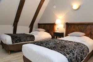 Hotels Logis L'Ecu De France : photos des chambres