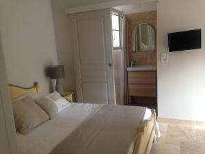 Maisons de vacances La Petite perle, balneo en supplement, le Clos des Perles : photos des chambres