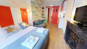 Appartements Les Charmettes du 6eme - Aulyondort : photos des chambres