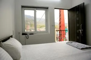 Sanidhya Inn - 瑞诗凯诗