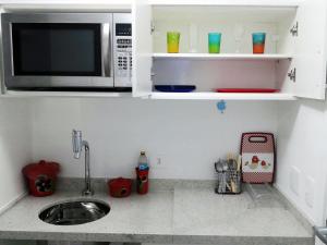 Studio Aconchego, próximo a Rua da Consolação, aos Metros República e Anhangabaú, com ar condicionado, piscina, academia, wifi e varanda