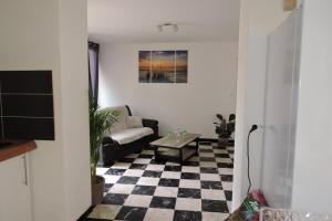 Appartements Le Clos Des Orangers : photos des chambres