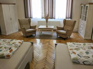 Three-Bedroom Apartment with City View room in Apartments Týnská 7