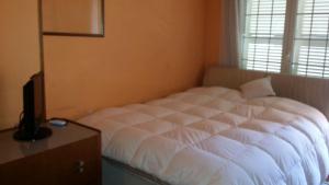 Doppelzimmer mit Balkon (2 Erwachsene + 1 Kind)