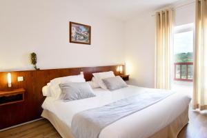 Hotels Logis Hotel Baratxartea : photos des chambres