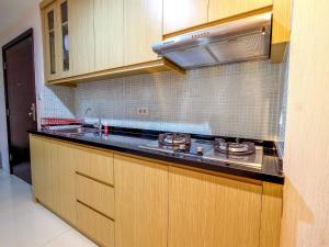 1BR Apartment at Casa Grande Residence near Kota Kasablanka By Travelio