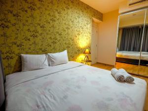 1BR Apartment at Casa Grande Residence near Kota Kasablanka By Travelio