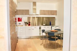 Appartements LE CONFIDENTIEL by Cocoonr : photos des chambres