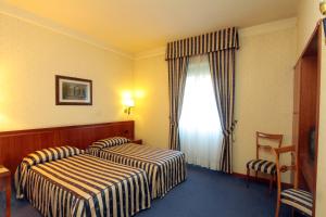 Triple Room room in Hotel De Paris
