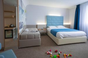 Hotels Hotel Plaza - site du Futuroscope : Chambre Triple Premium