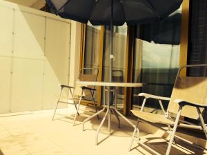 One-Bedroom Apartment with Balcony room in Arkadia Palace Apartments