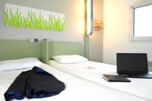 Hotels ibis budget Rouen Parc des Expos Zenith : photos des chambres