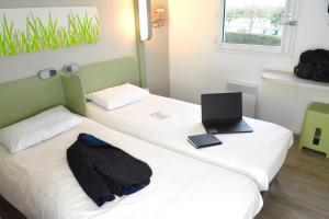 Hotels ibis budget Rouen Parc des Expos Zenith : Chambre Lits Jumeaux