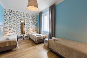 Standard Triple Room with Private Bathroom room in Premium Hostel