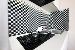 Studio Green Pramuka City a Serene Apartment Living By Travelio