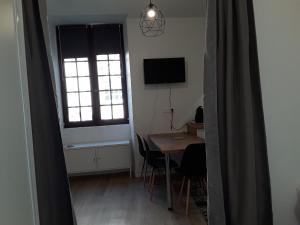 Appartements Appartement les Regrattiers : photos des chambres