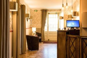 Hotels Logis Hotel de la Poste : photos des chambres