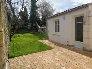 Appartements Un jardin sur le toit - Saintes : photos des chambres