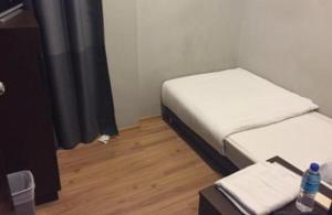 Phòng Standard giường đơn có phòng tắm dùng chung (Standard Single Room with Shared Bathroom)