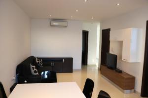 Three-Bedroom Apartment room in InStyle Aparthotel