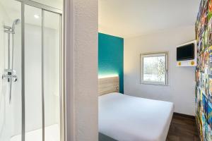 Hotels hotelF1 Saint Witz A1 Hotel : photos des chambres