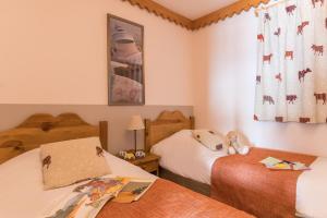 Two-Bedroom Apartment (6 People) room in Résidence Pierre & Vacances Premium Les Hauts Bois