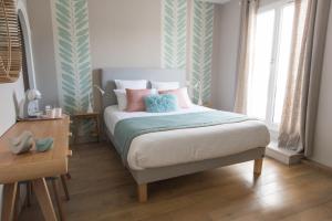 B&B / Chambres d'hotes A l'Ombre des Pins : photos des chambres