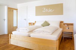 Double Room with Balcony (2 Adults + 1 Child) room in Gästehaus In da Wiesn