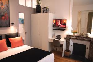 Appartements L'Art Studio hyper centre : photos des chambres