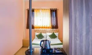 Treebo Naunidh Suites - Pune