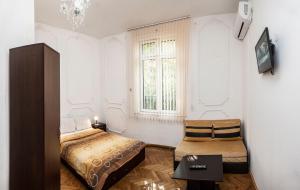 Double Room with Sofa Bed room in Central GuestHouse Five Corners