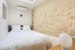 Appartements Pick A Flat's Apartment in Saint Germain - Rue Corneille : photos des chambres