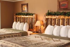 Queen Room with Two Queen Beds room in The Evergreen