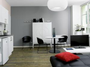 Appartements Le 32 : photos des chambres